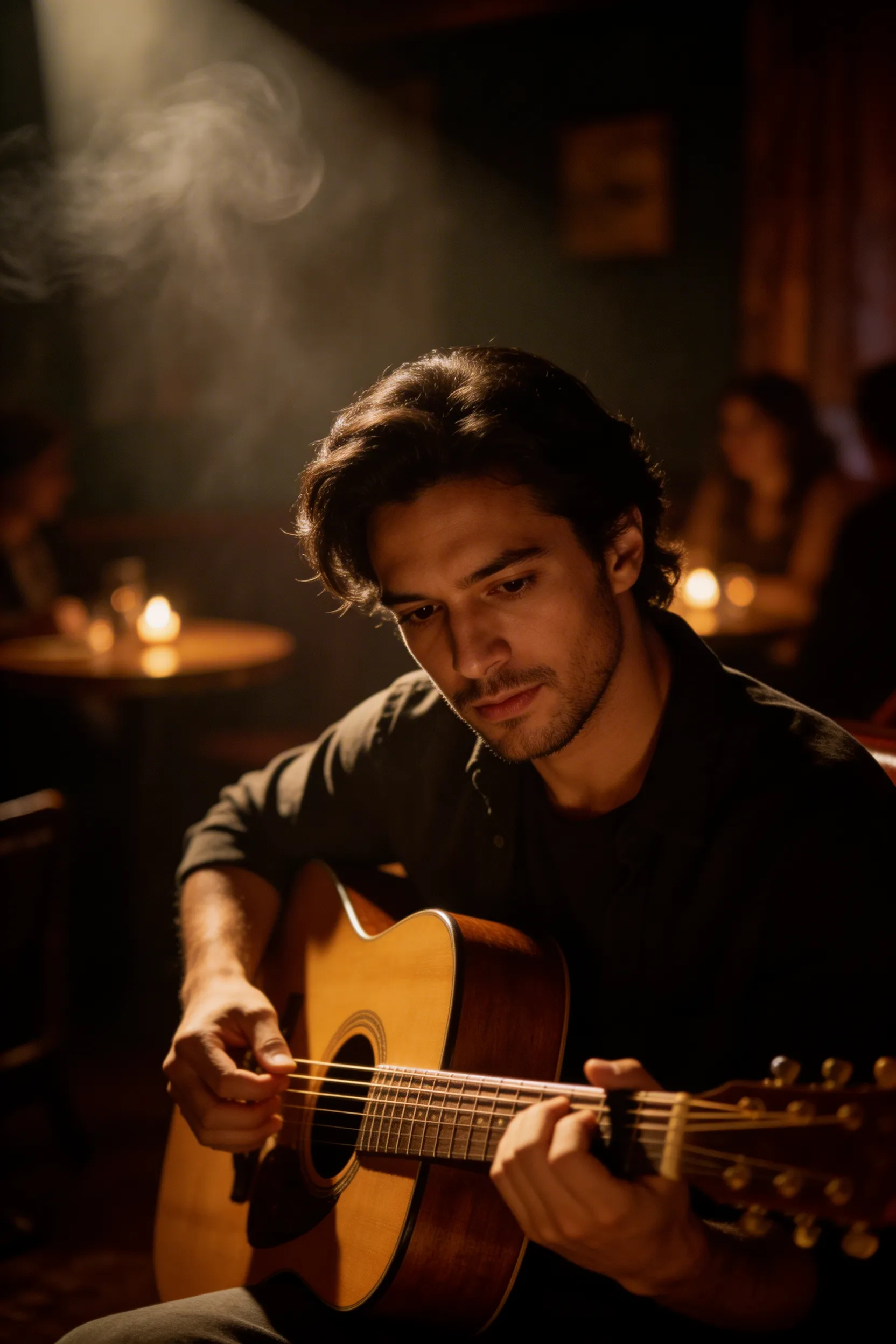 A moody, low-light photograph of a handsome Hispanic man with soulful eyes playing an acoustic guitar in a dimly lit, smoky jazz club.